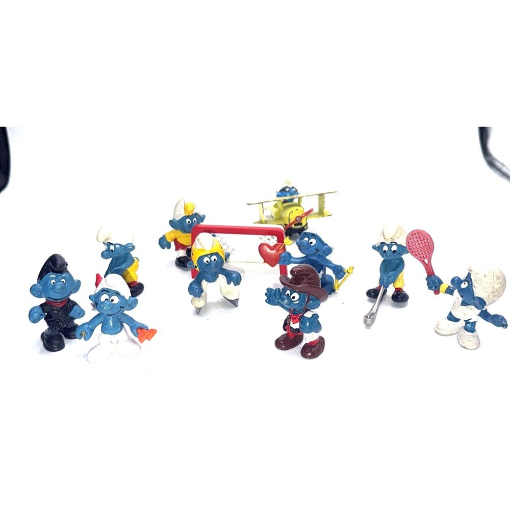 Lot Of 10 Vintage Smurfs Lot Sports, plane and others
